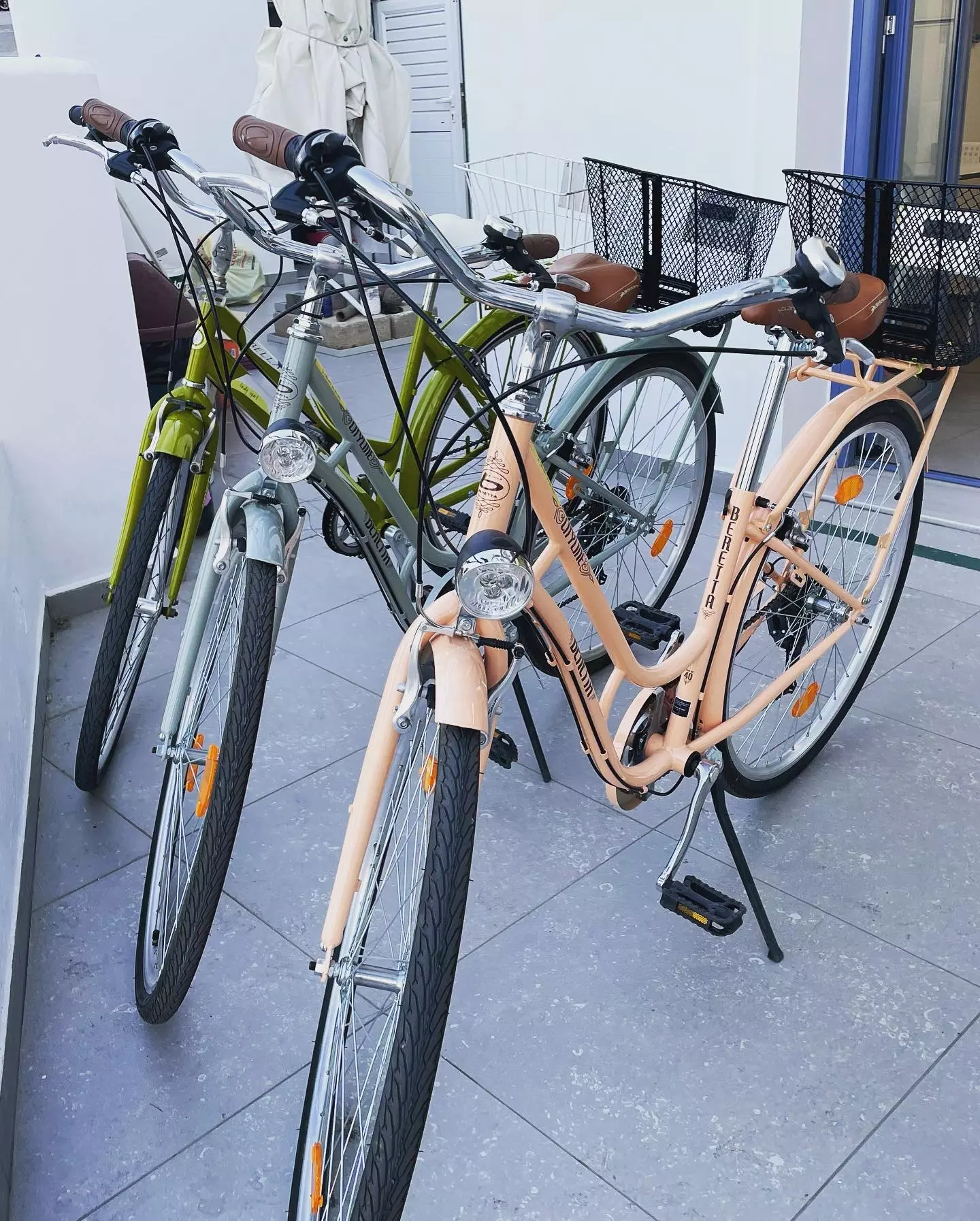Three colourful bikes from a different angle
